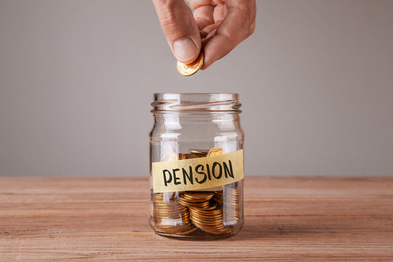 Pension. Glass jar with coins and an inscription pension