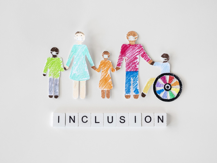 with disables person cutout paper inclusion concept
