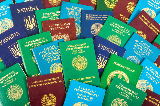 Different foreign passports as colorful background